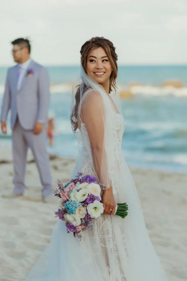 Angie, bride and groom on their wedding photosession at Riviera Maya