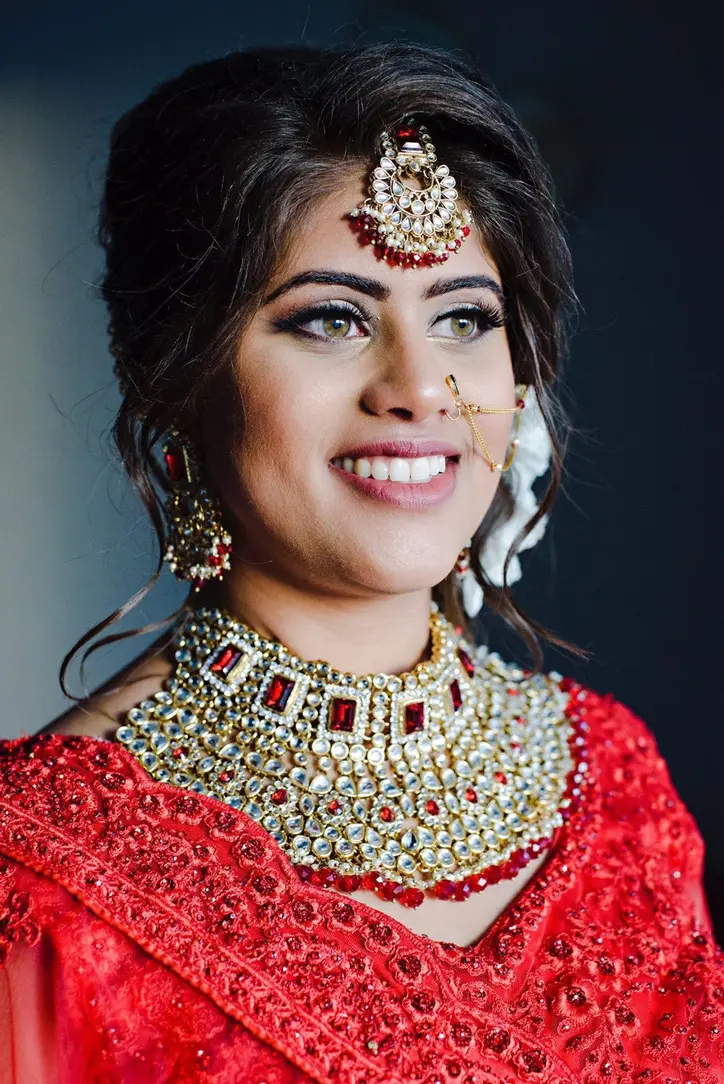 South Asian bride gets her makeup and hair by Alex Corbanezi in costa Mujeres at gran palladium, Cancun