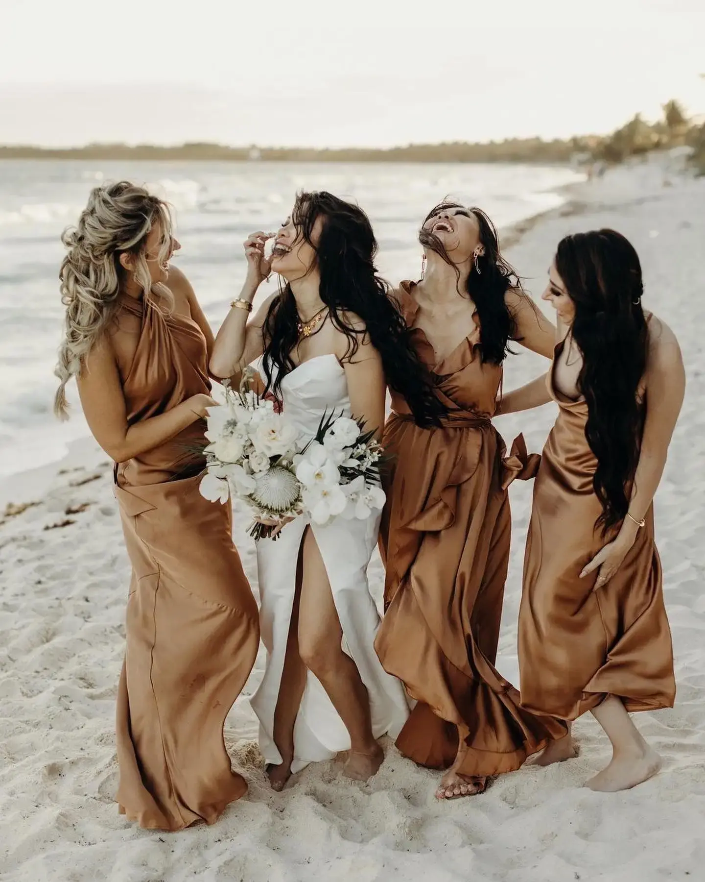 bridal party at a Tulum beach after the wedding at Hilton Tulum