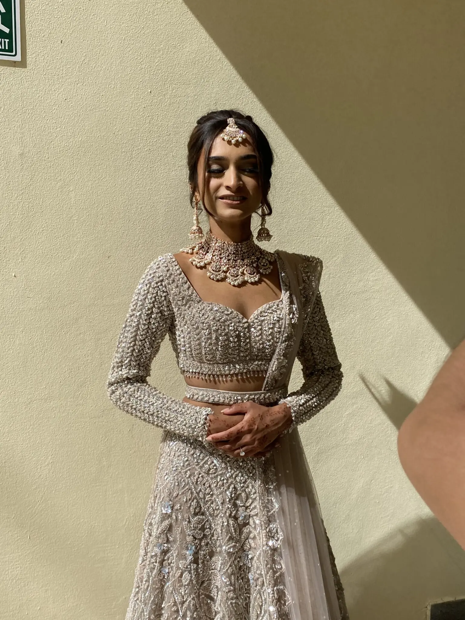 beautiful South Asian wedding at El dorado Royale, bride is happily getting photos taken